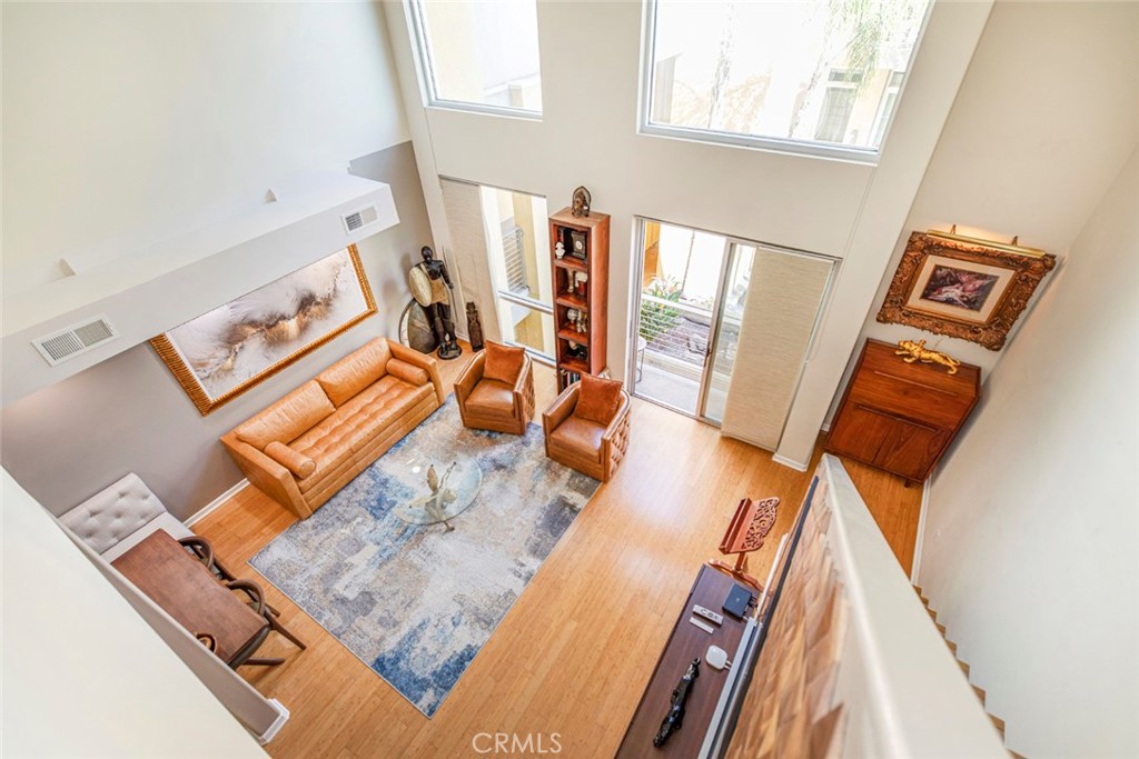 a view of living room with furniture and a flat screen tv