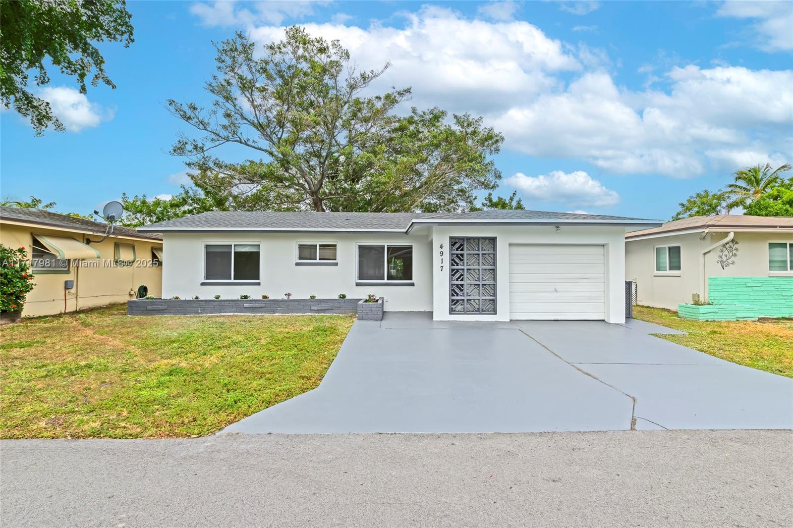 front view of house with a yard