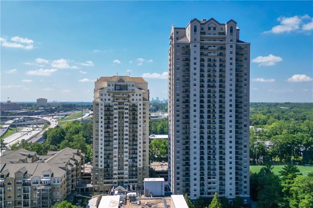 a view of a city with tall buildings