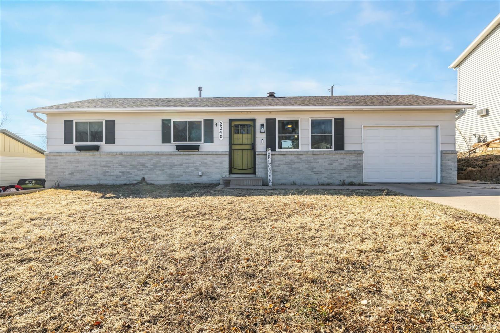 a front view of house with yard