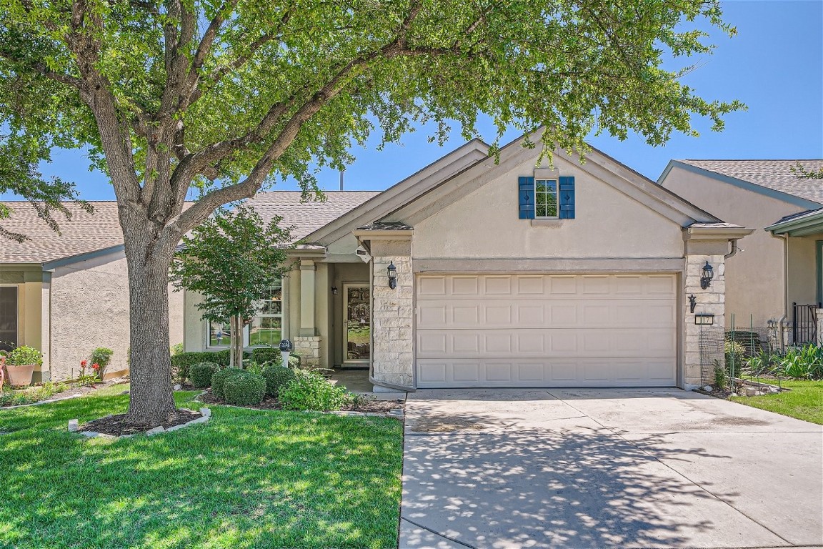 Welcome home to 117 Butterfly Cove. Nicely landscaped yard and the mature tree offers lots of shade.