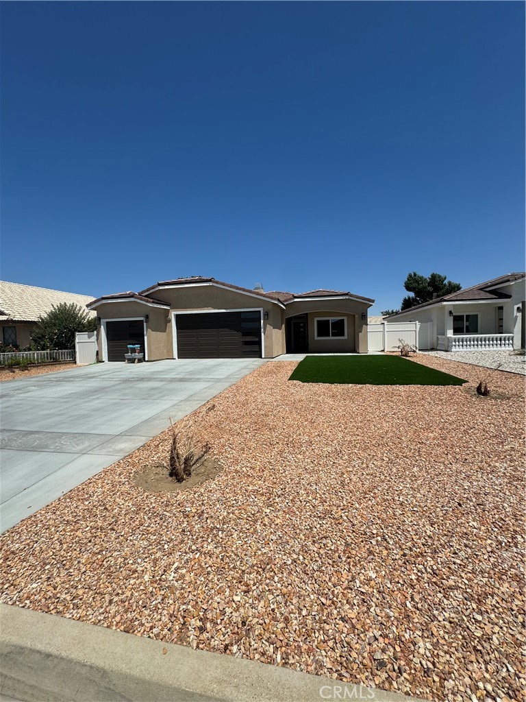 a view of house with outdoor space