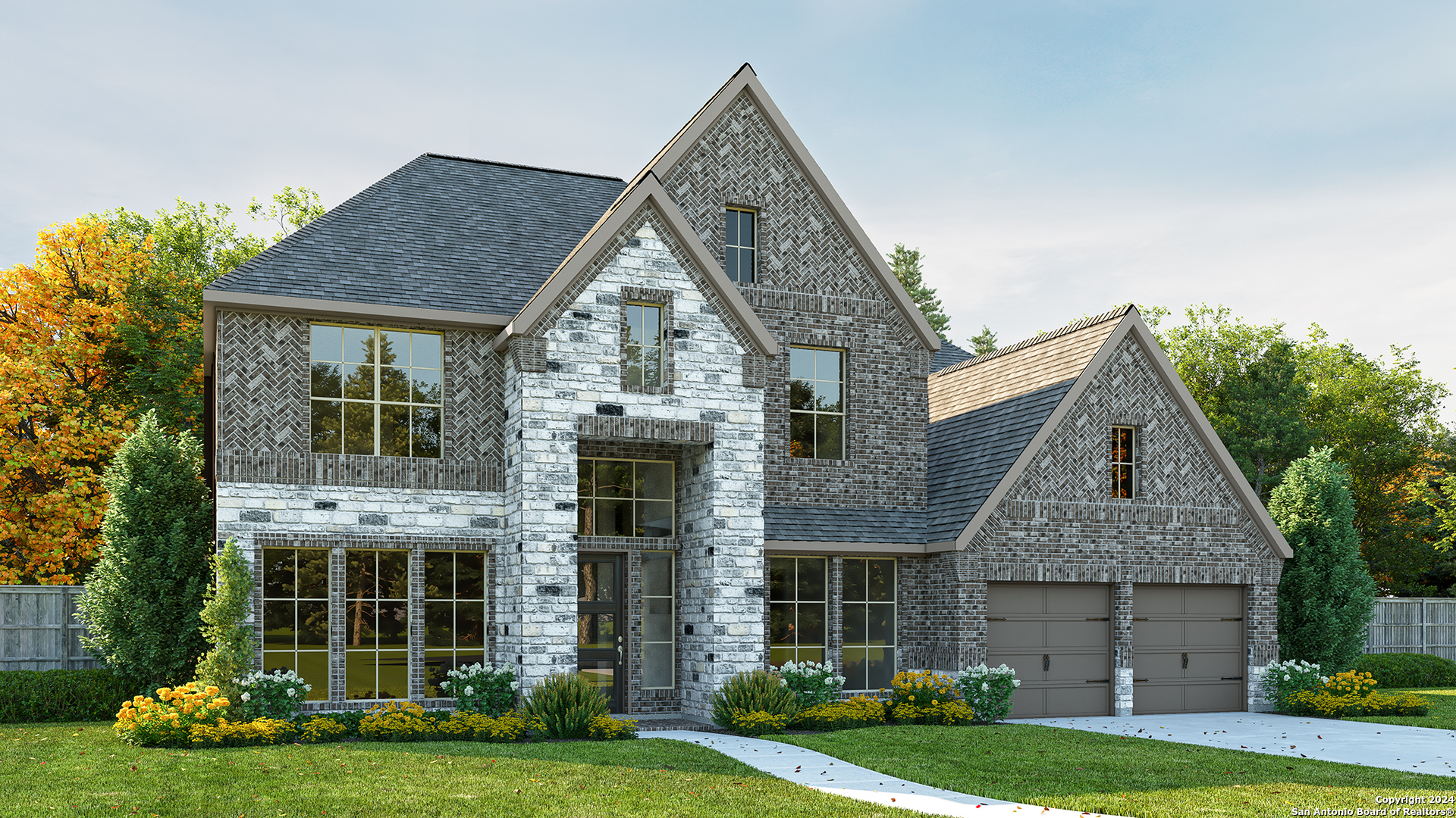 a front view of a house with a yard and garage