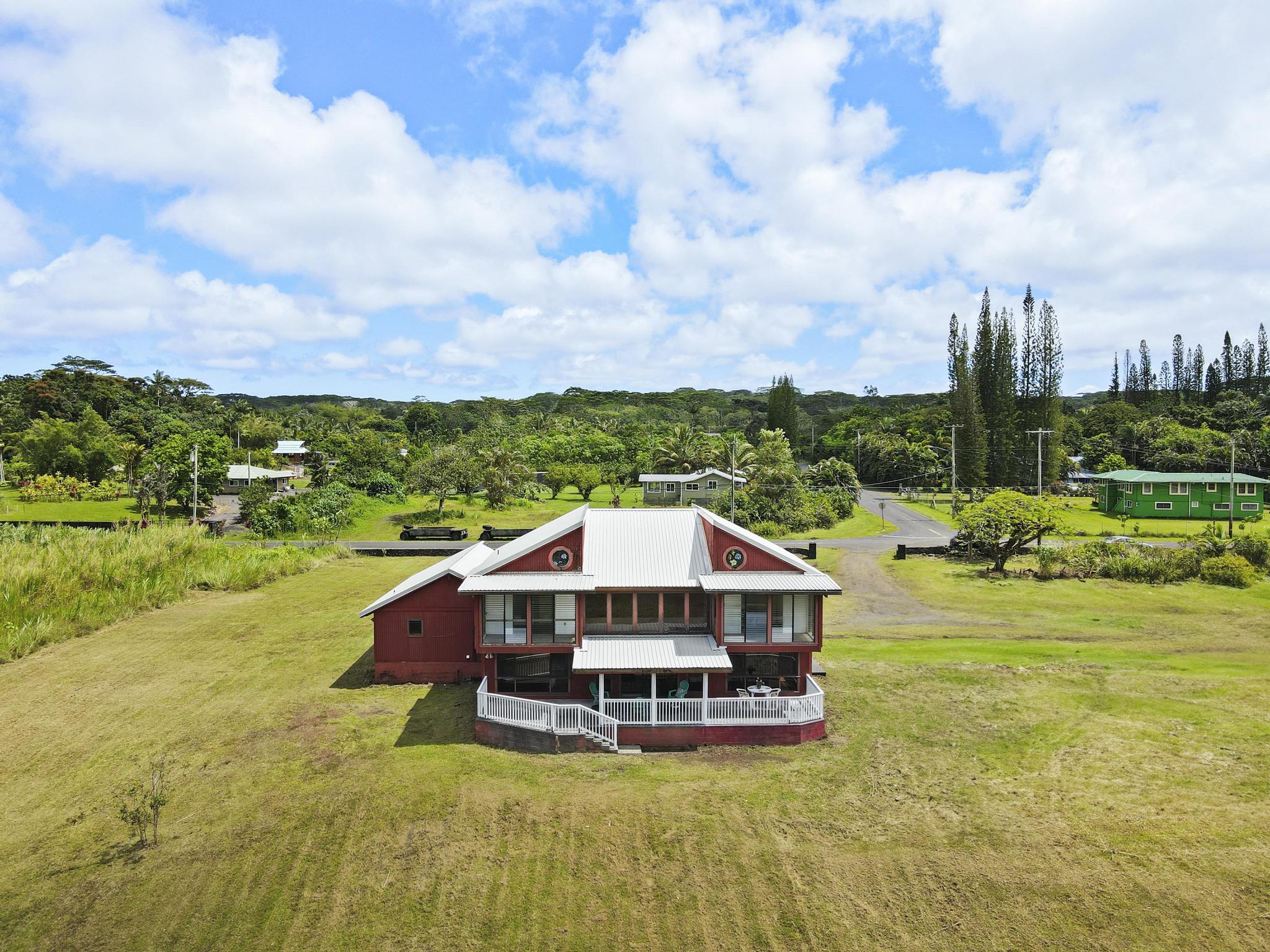 Arial view from the rear of the property.  Brand new 26 gage roof and cleared 2.23 level acreage.  This is a very special opportunity priced well below assessed value.