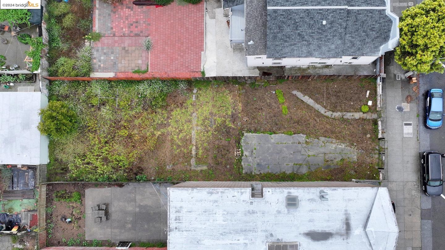 an aerial view of residential house with outdoor space