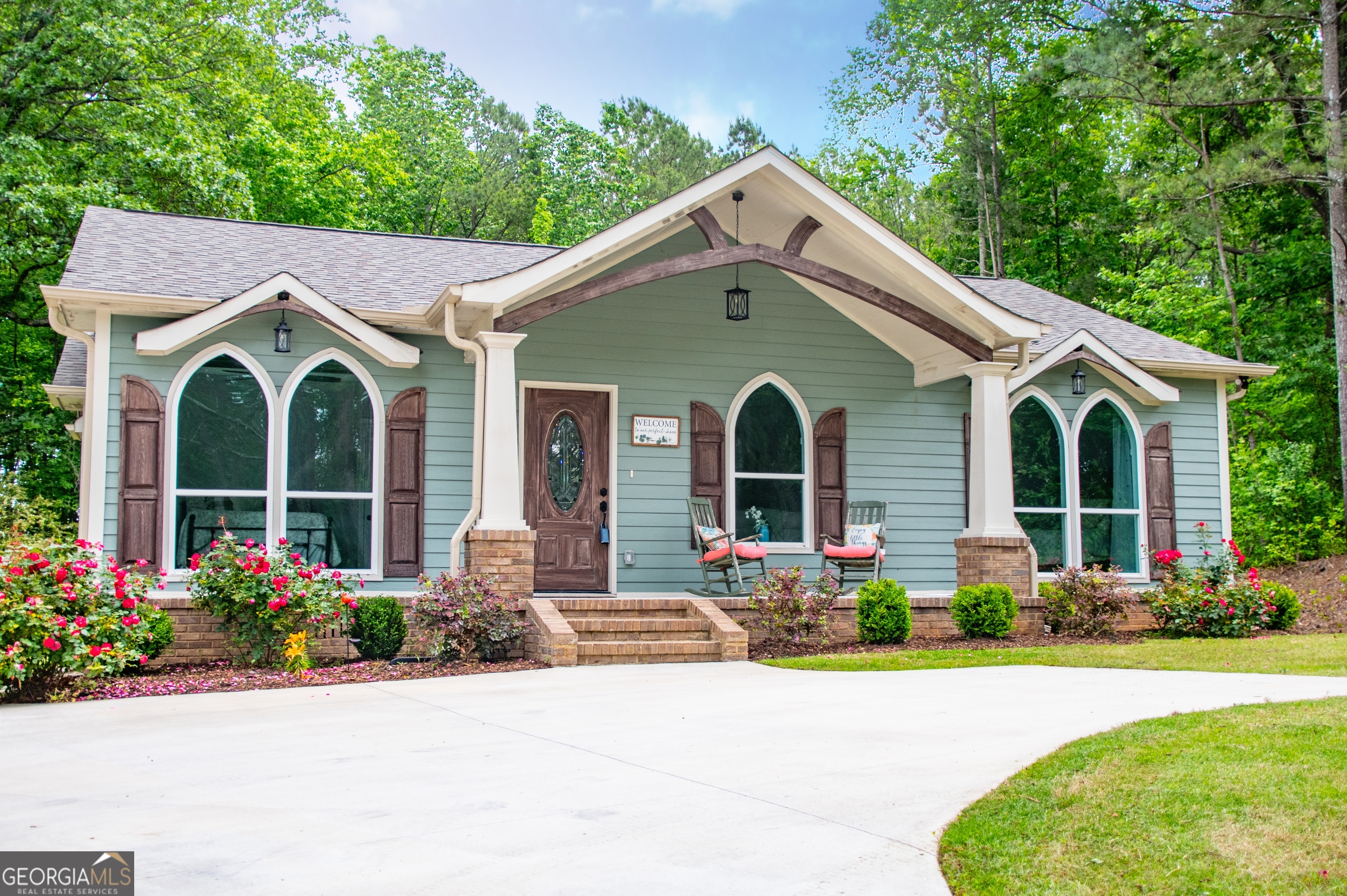 a front view of a house with yard