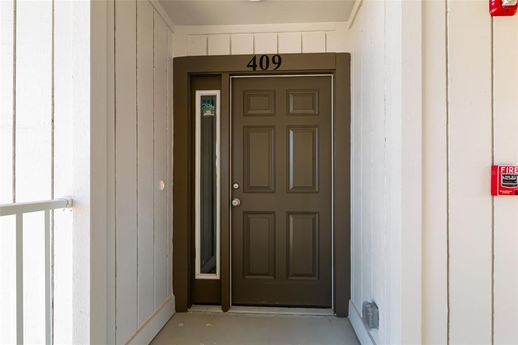 a view of front door with hallway