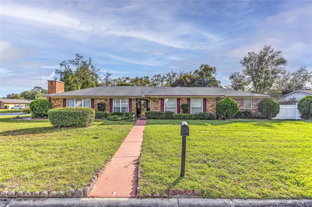 front view of a house with a yard