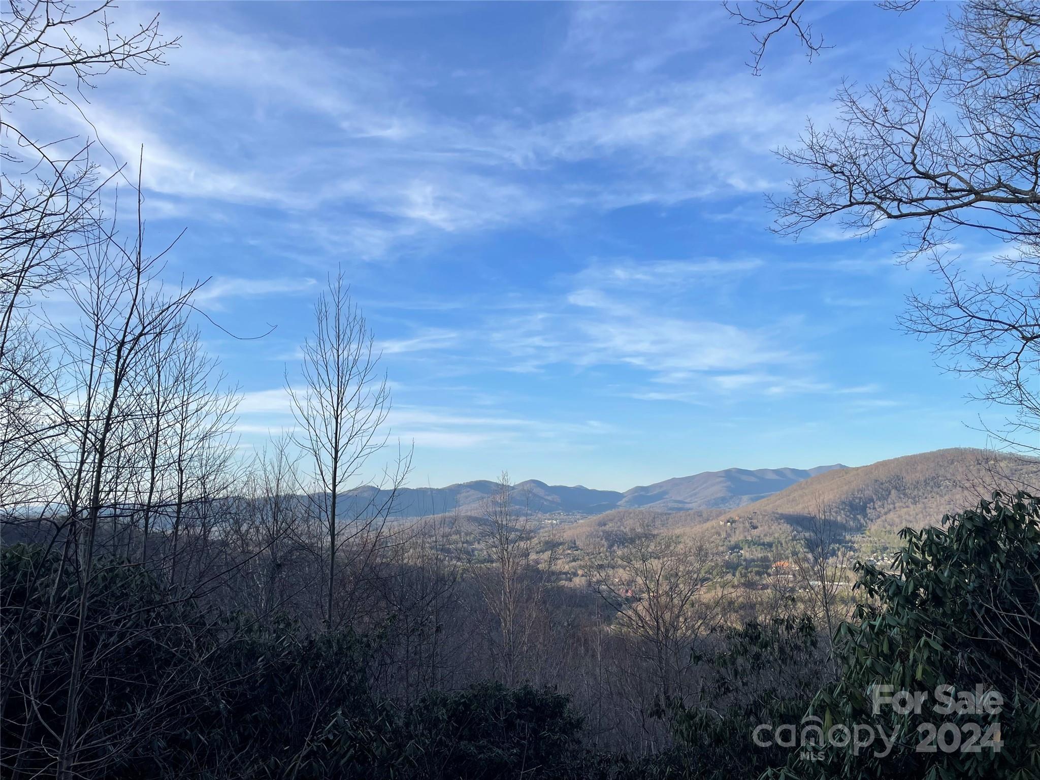 a view of mountain view with mountains in the background