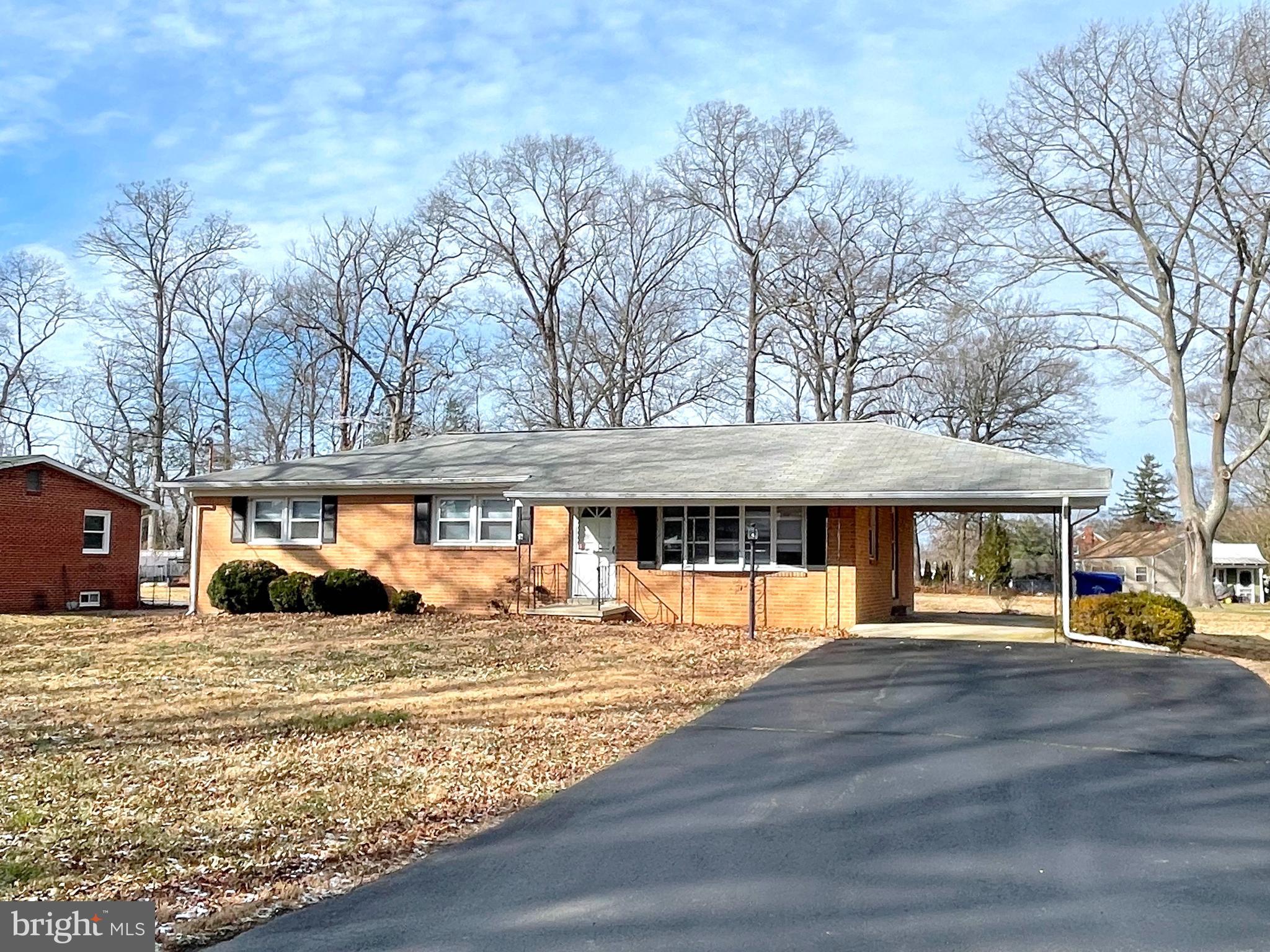 3BR 1.5FB rambler w/basement and carport