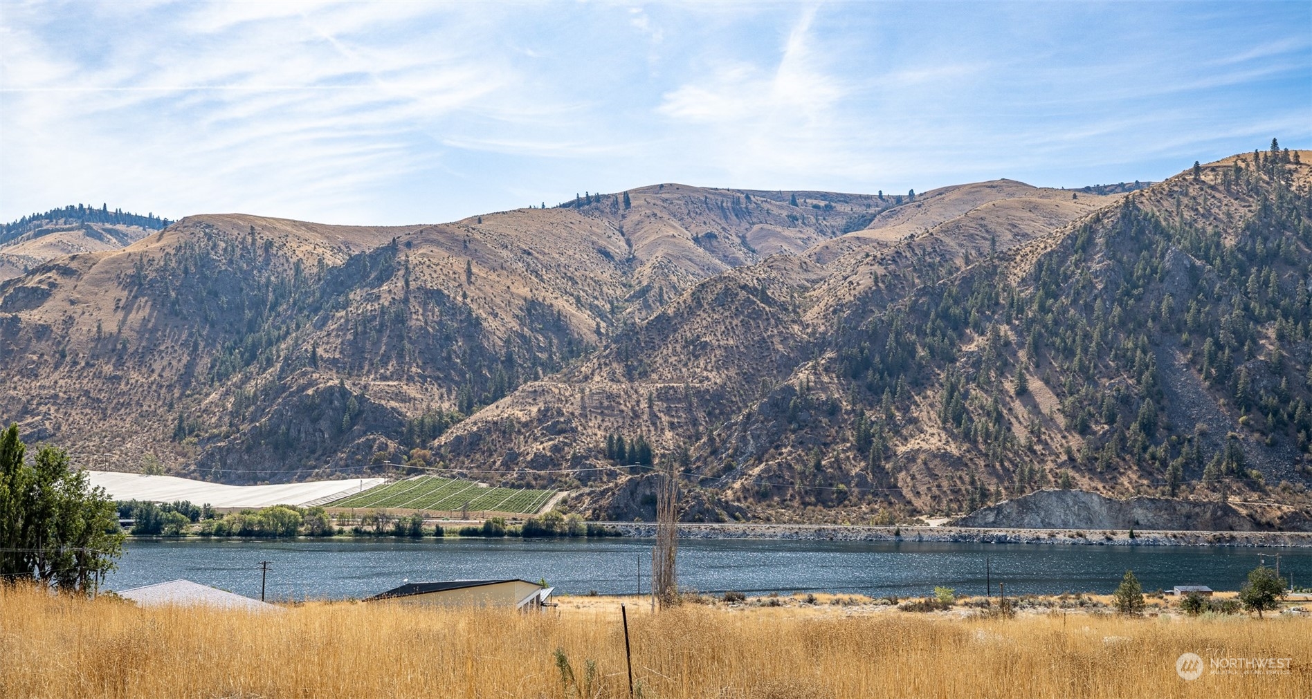 a view of a lake with mountains in the background