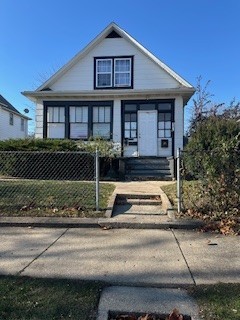 a front view of a house with garage