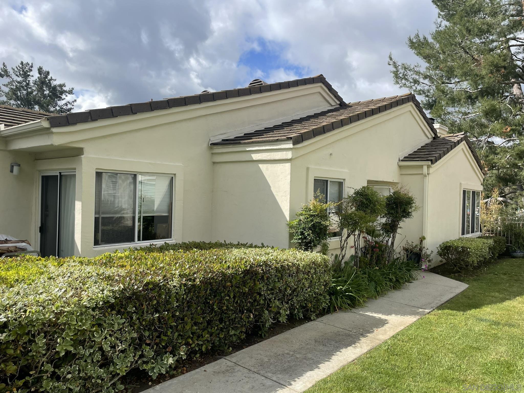 a house view with a garden space