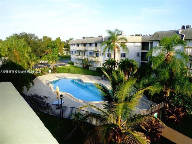 a view of a house with a swimming pool