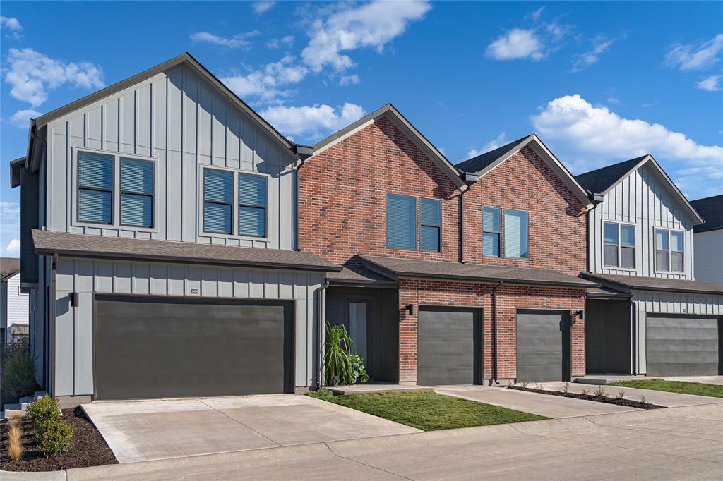 a front view of a house with yard