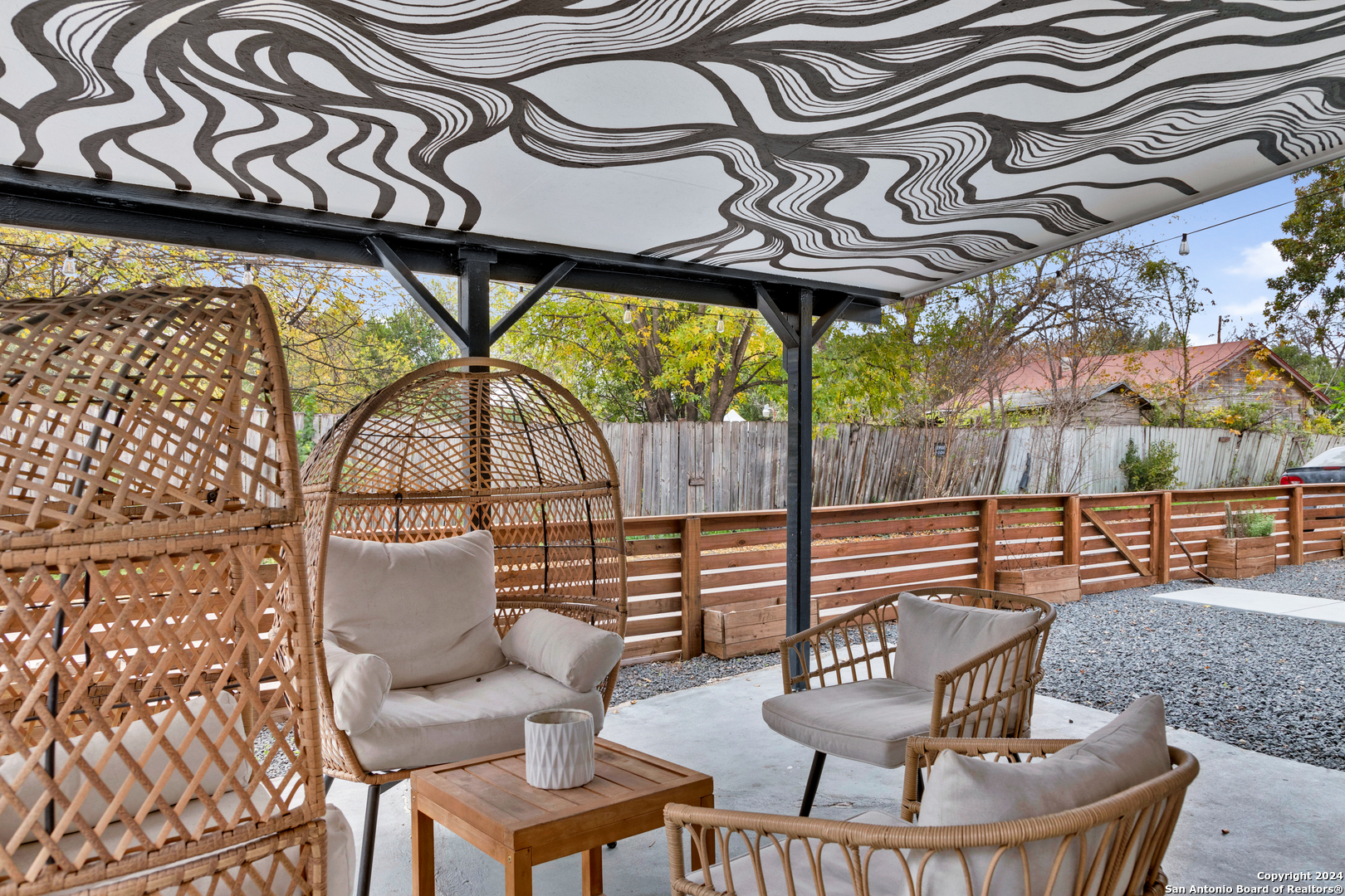 a table and chairs in a patio