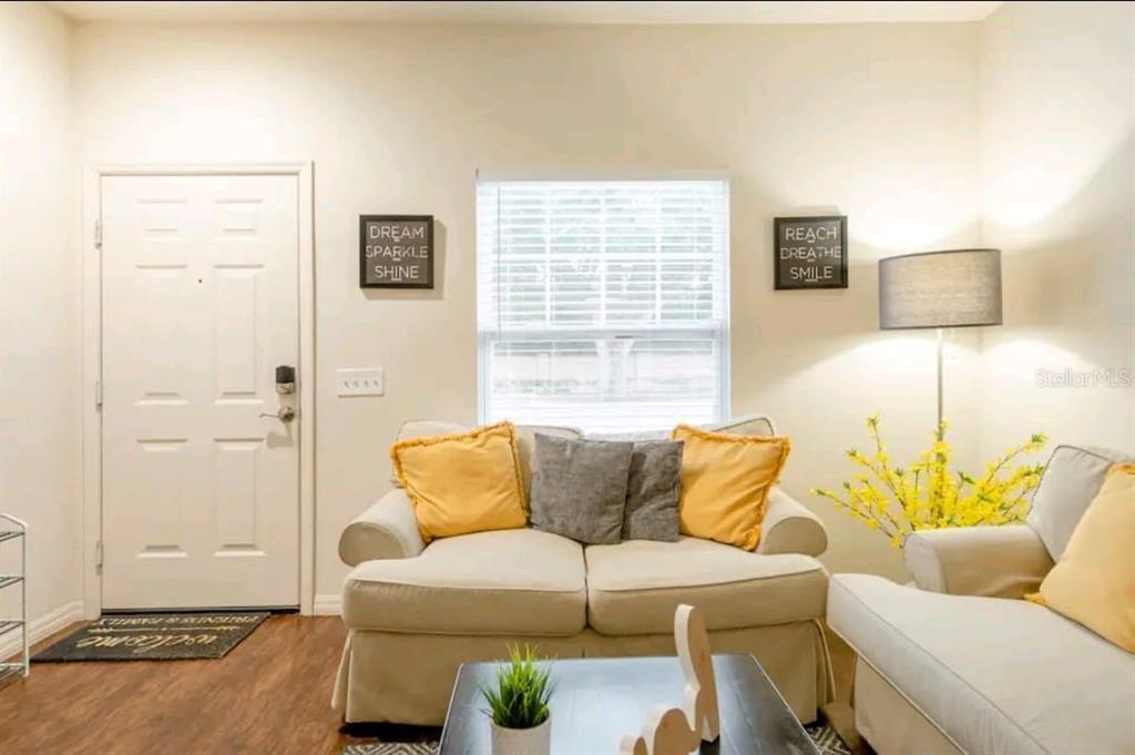 a living room with furniture and a couch