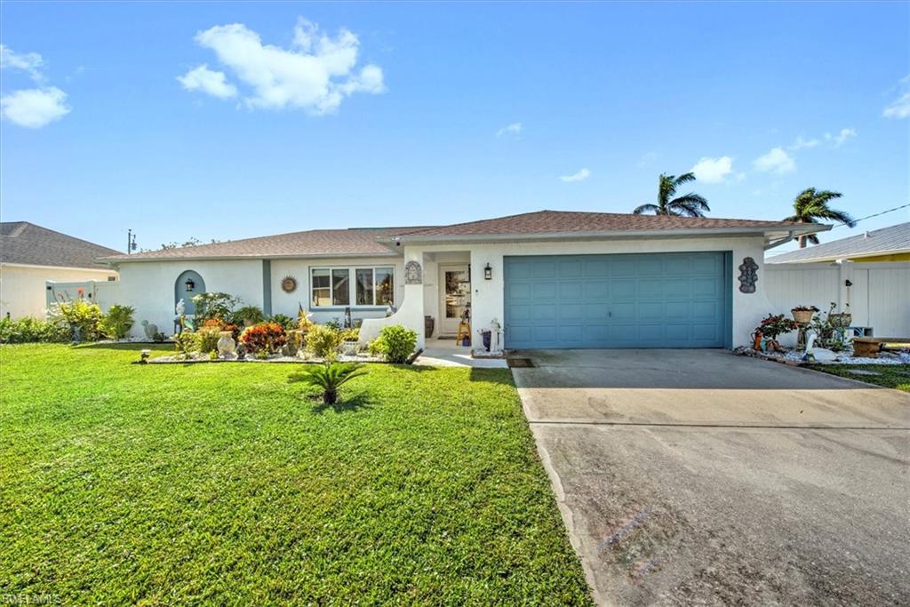 a view of a house with backyard porch and garden