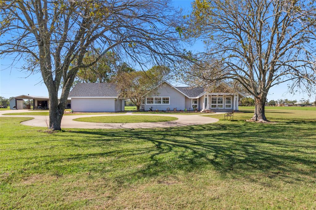 Circle driveway on the east side of the houst