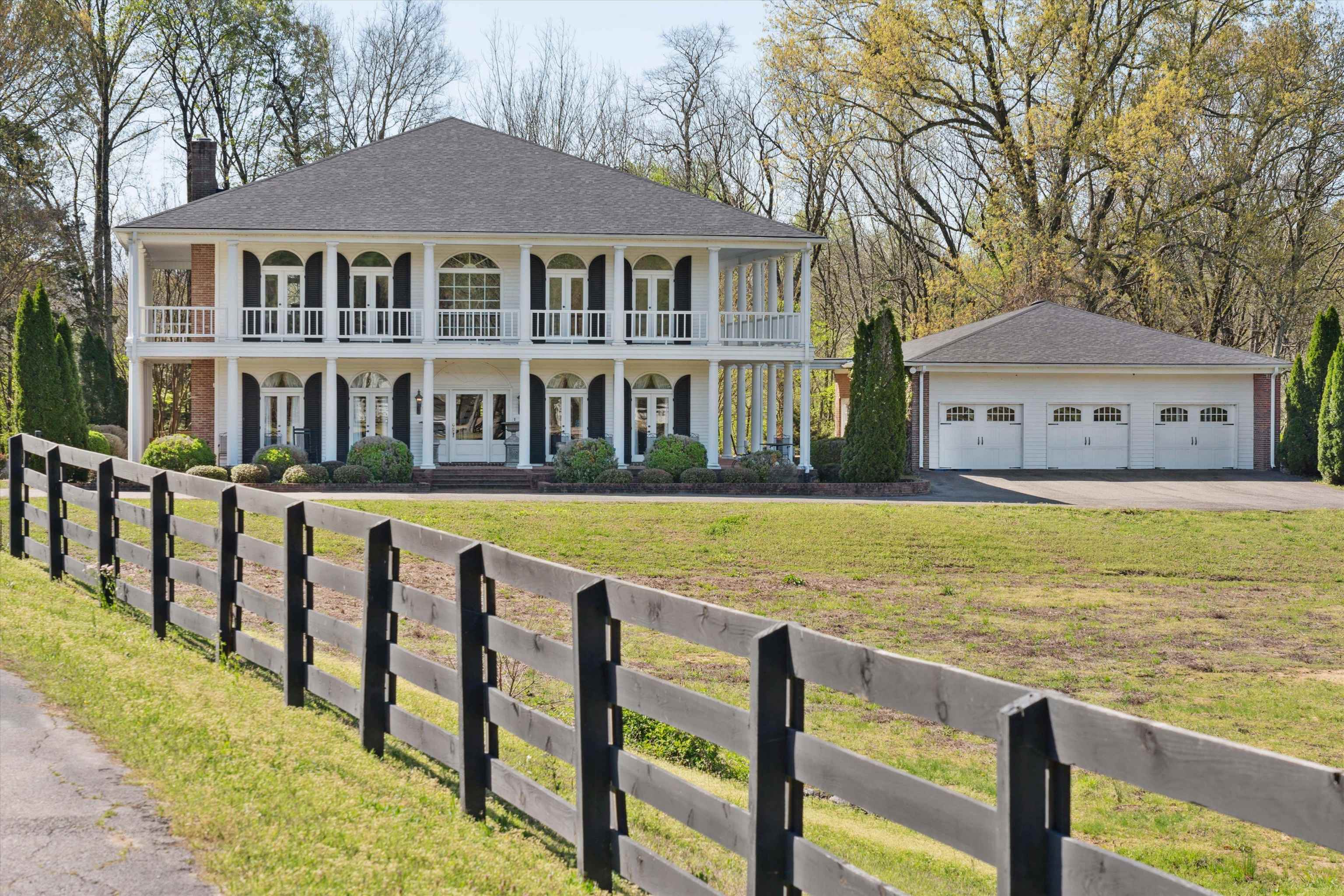 a front view of a house with swimming pool