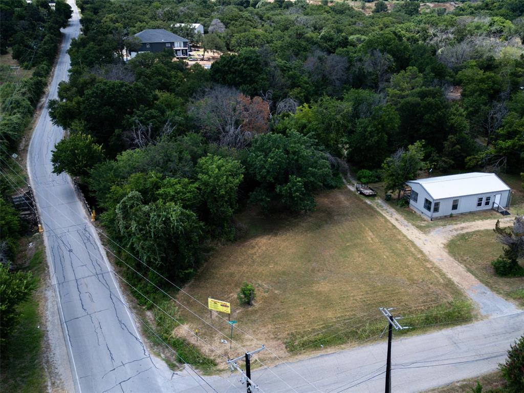 an aerial view of a house having yard