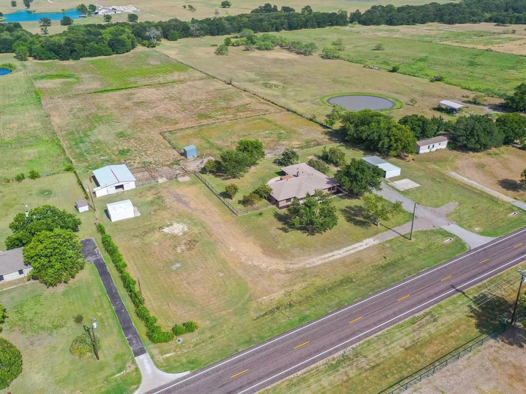 a view of a lake with a yard