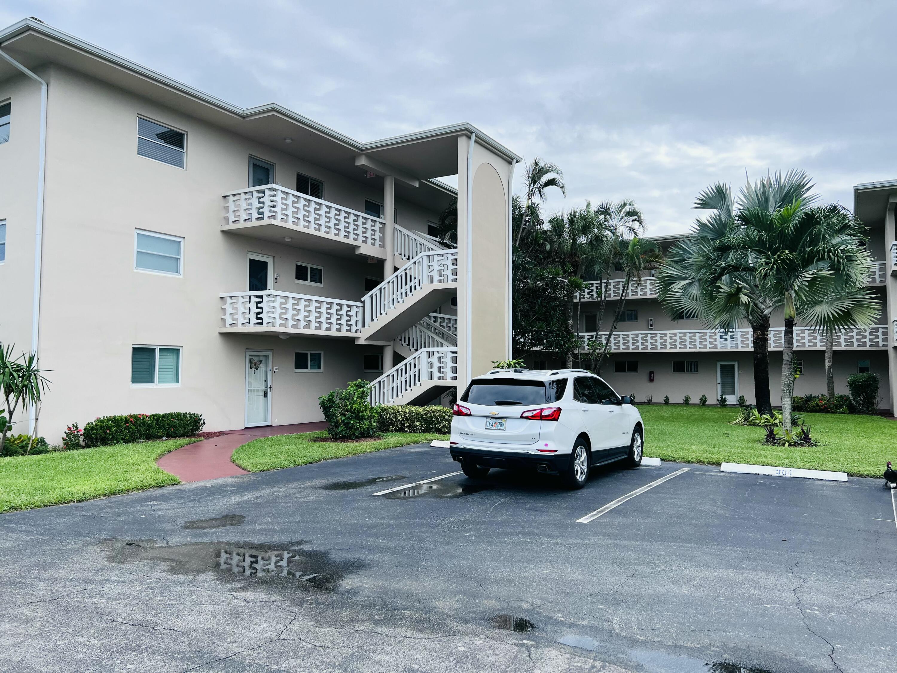 a car parked in front of a house