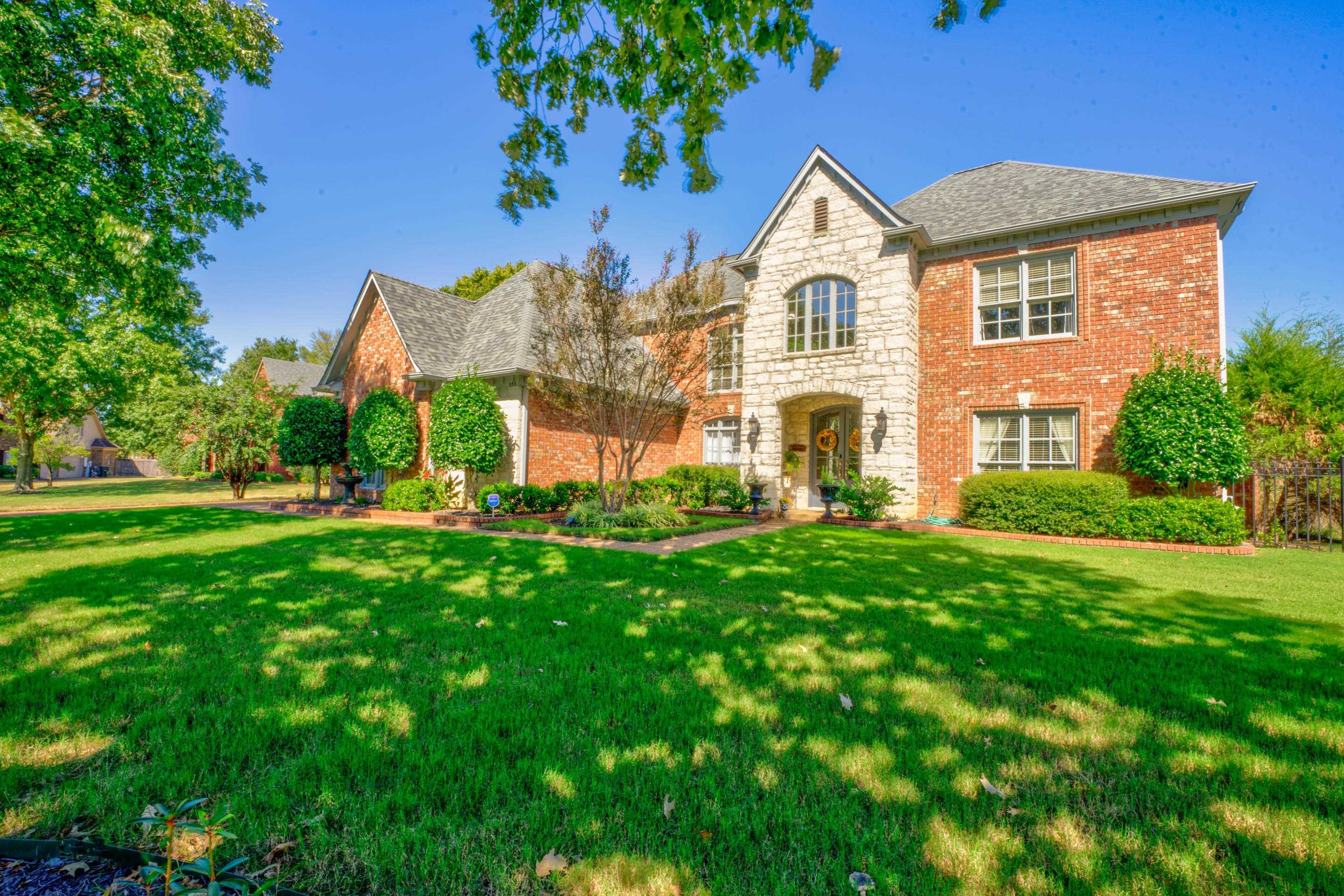 a house view with a garden space