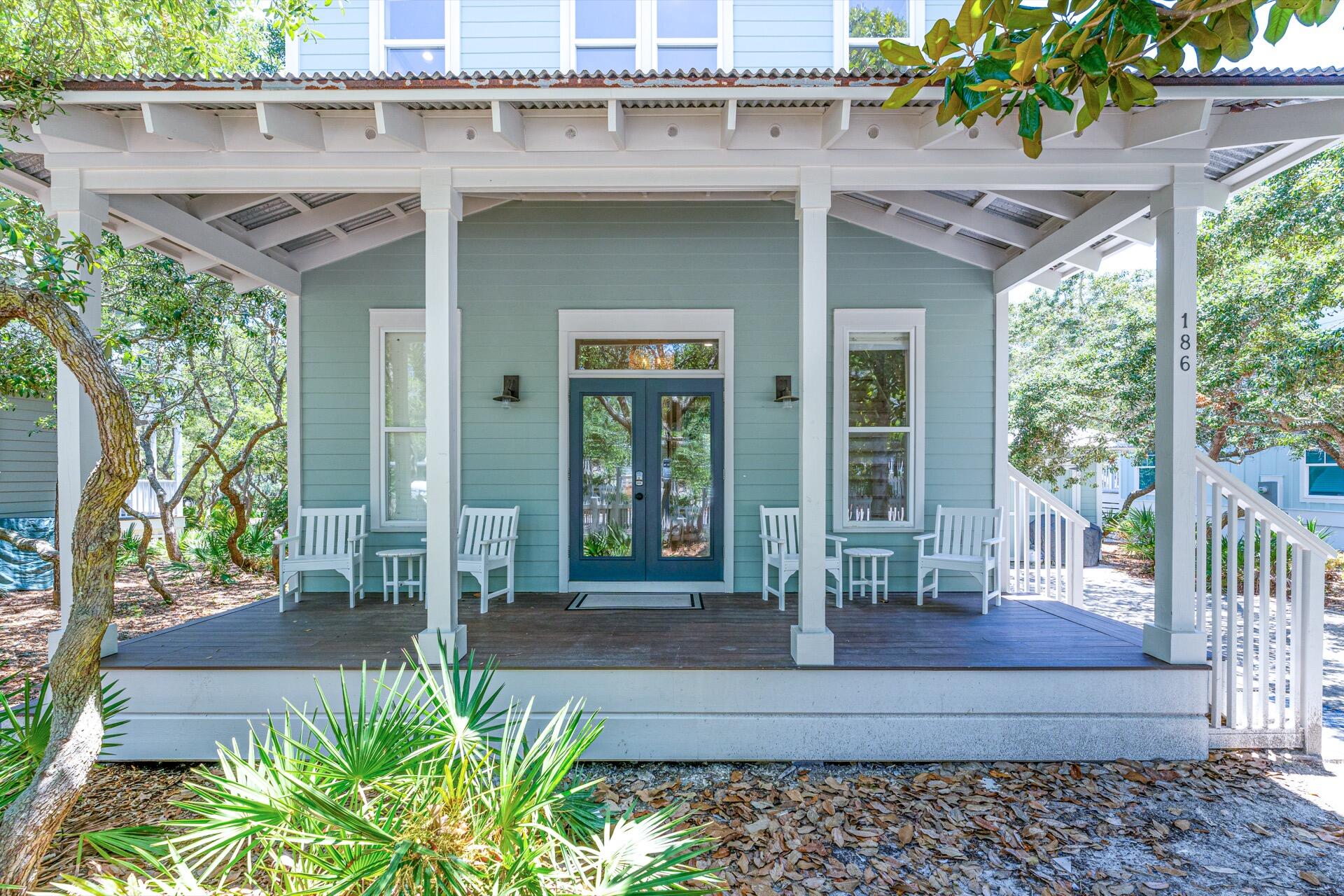 a front view of a house with a porch