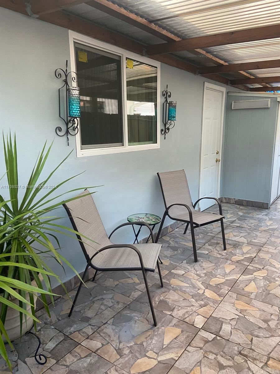 a view of a chairs and table in a house