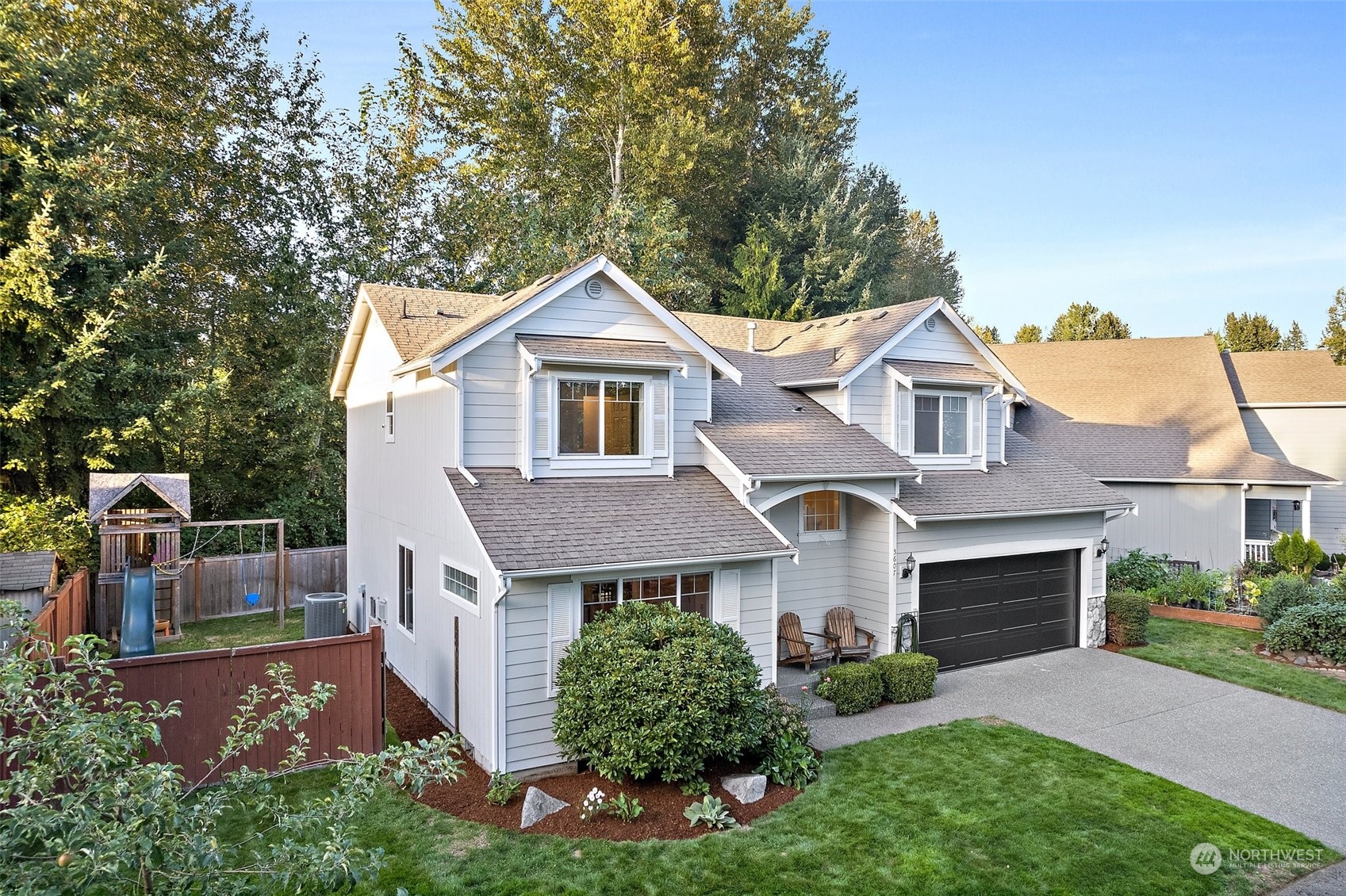 front view of a house with a yard