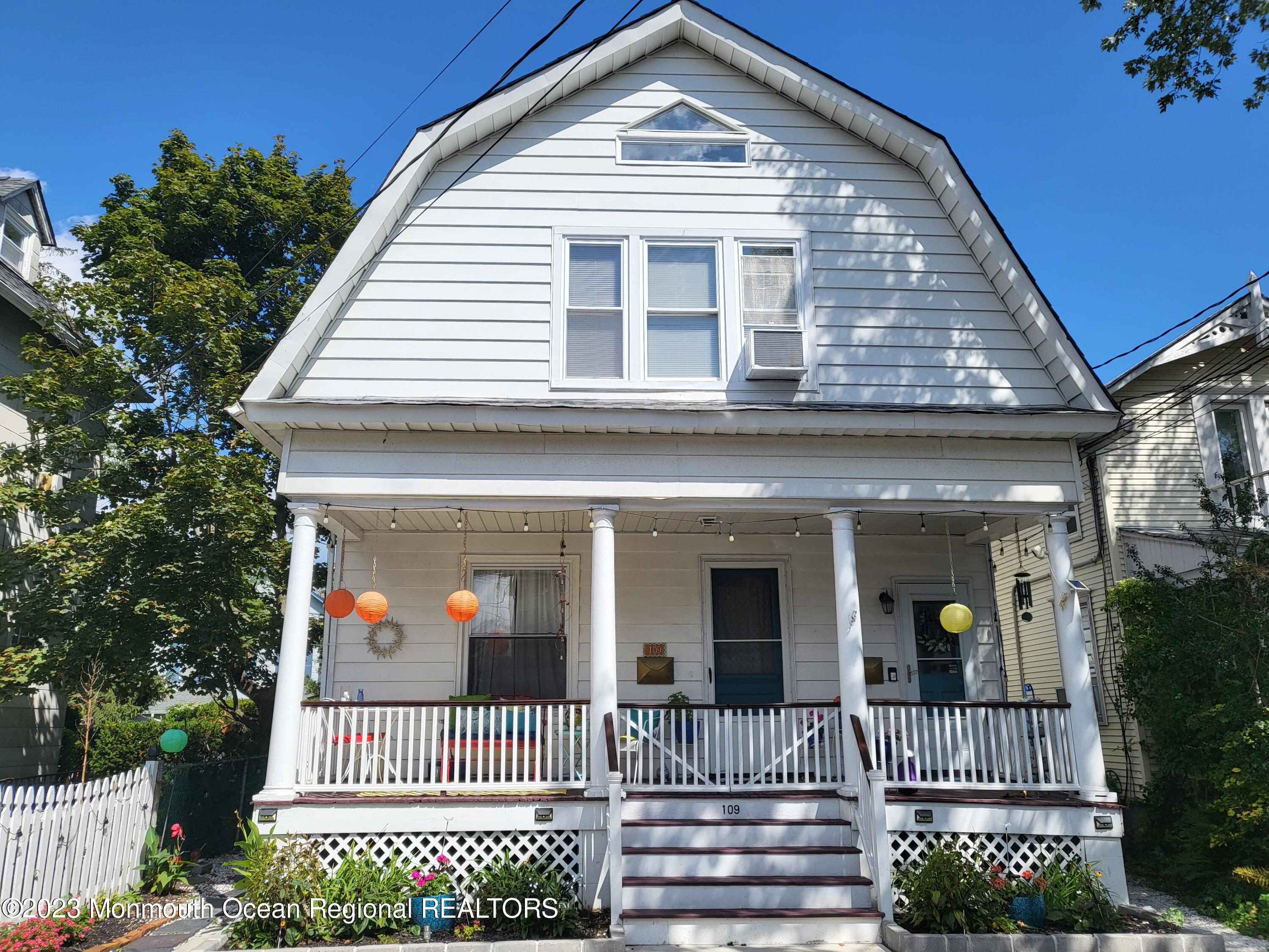 a front view of a house with a porch