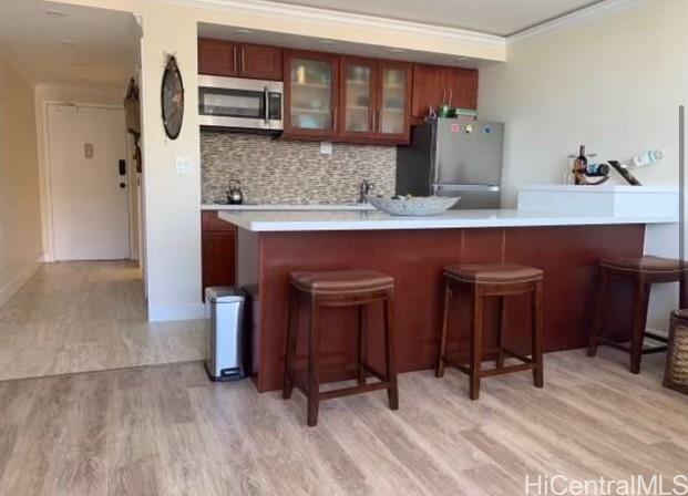 a kitchen with stainless steel appliances granite countertop a sink and cabinets