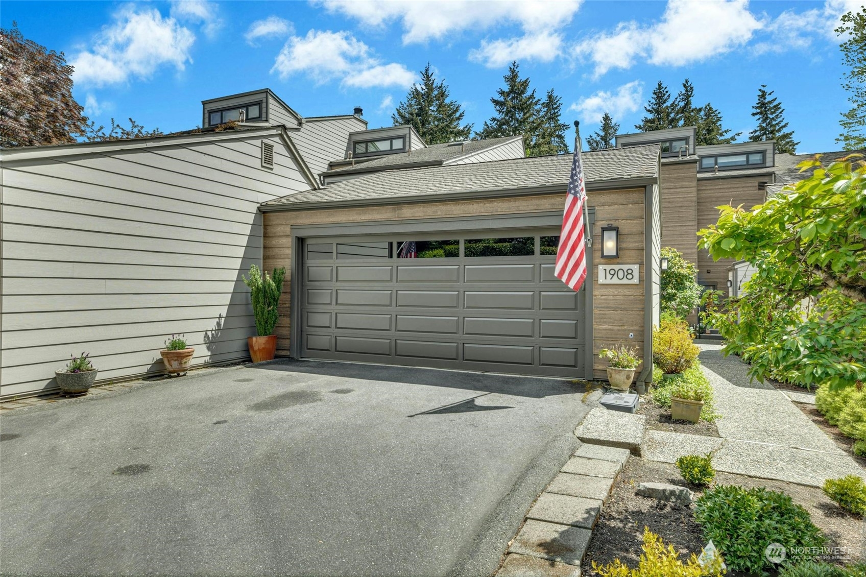 a view of a house with a garage