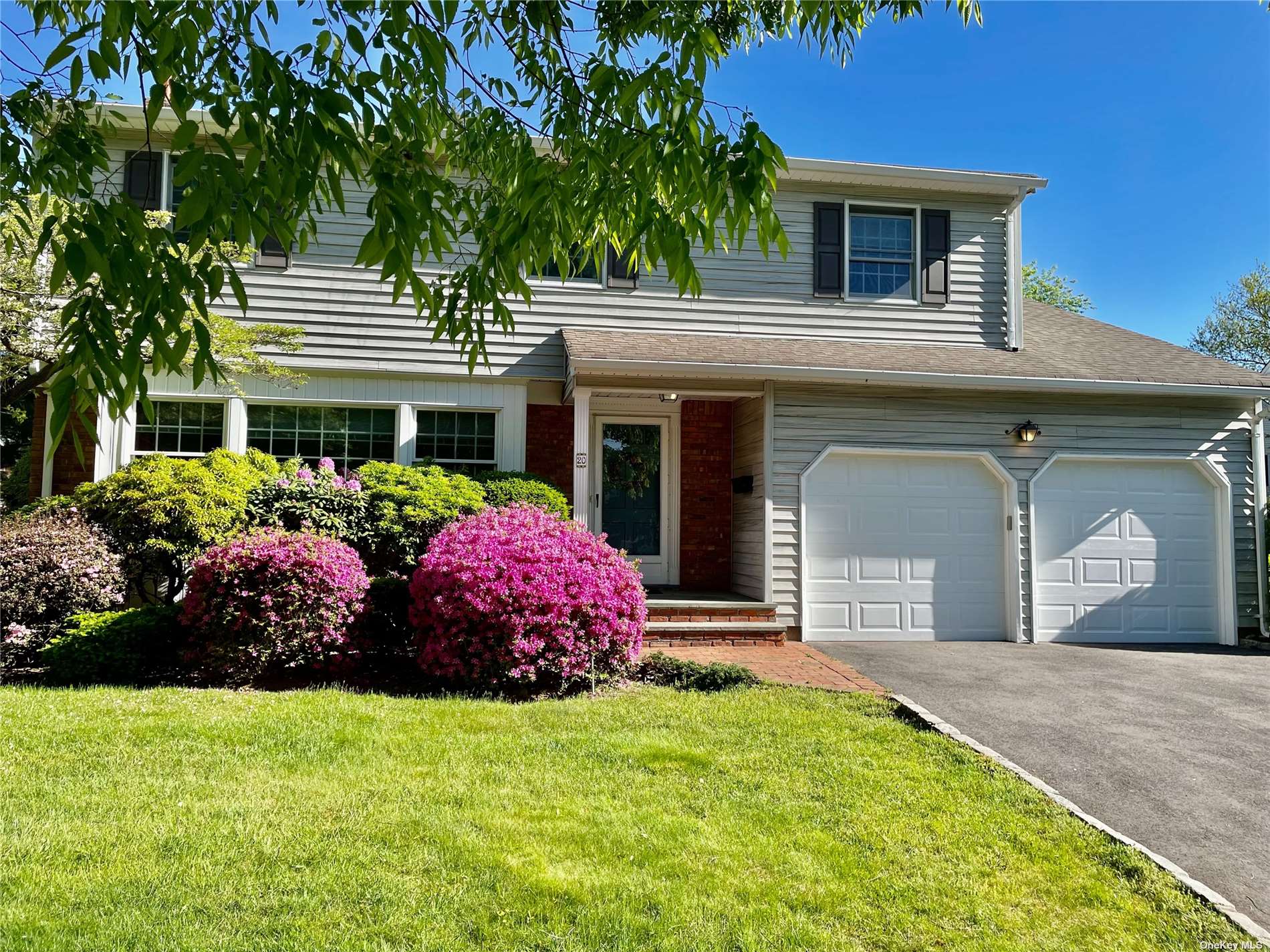 a front view of house with yard