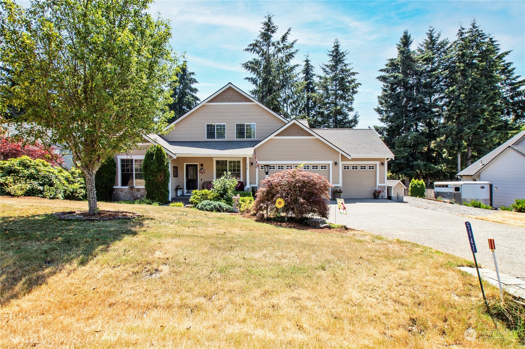 a front view of a house with a patio