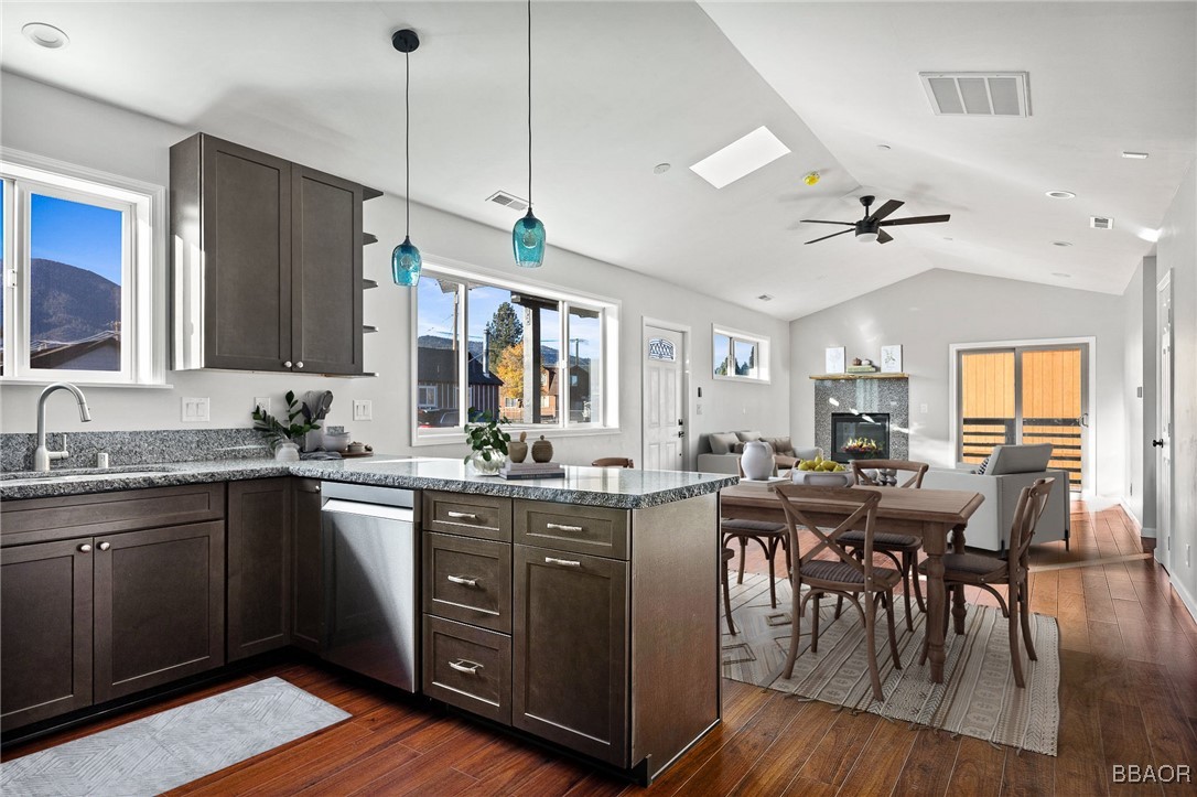 a kitchen with lots of counter top space and dining table