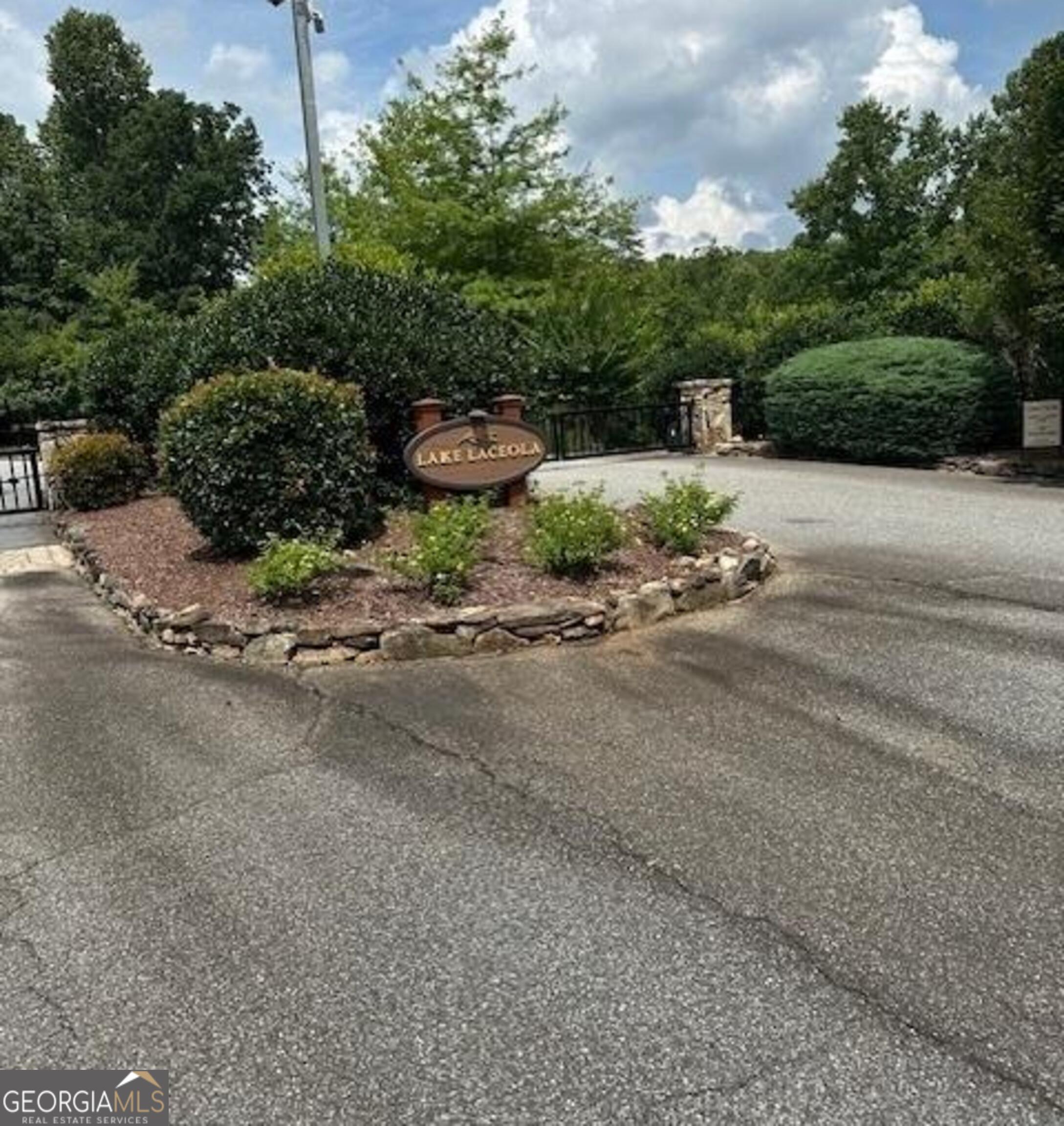 a view of a street with some trees