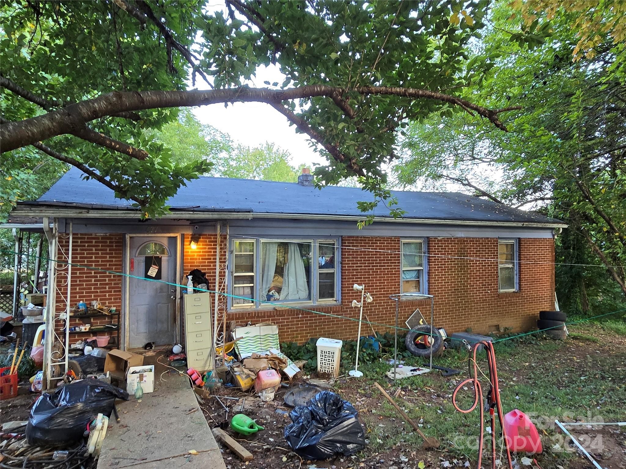 a backyard of a house with seating space