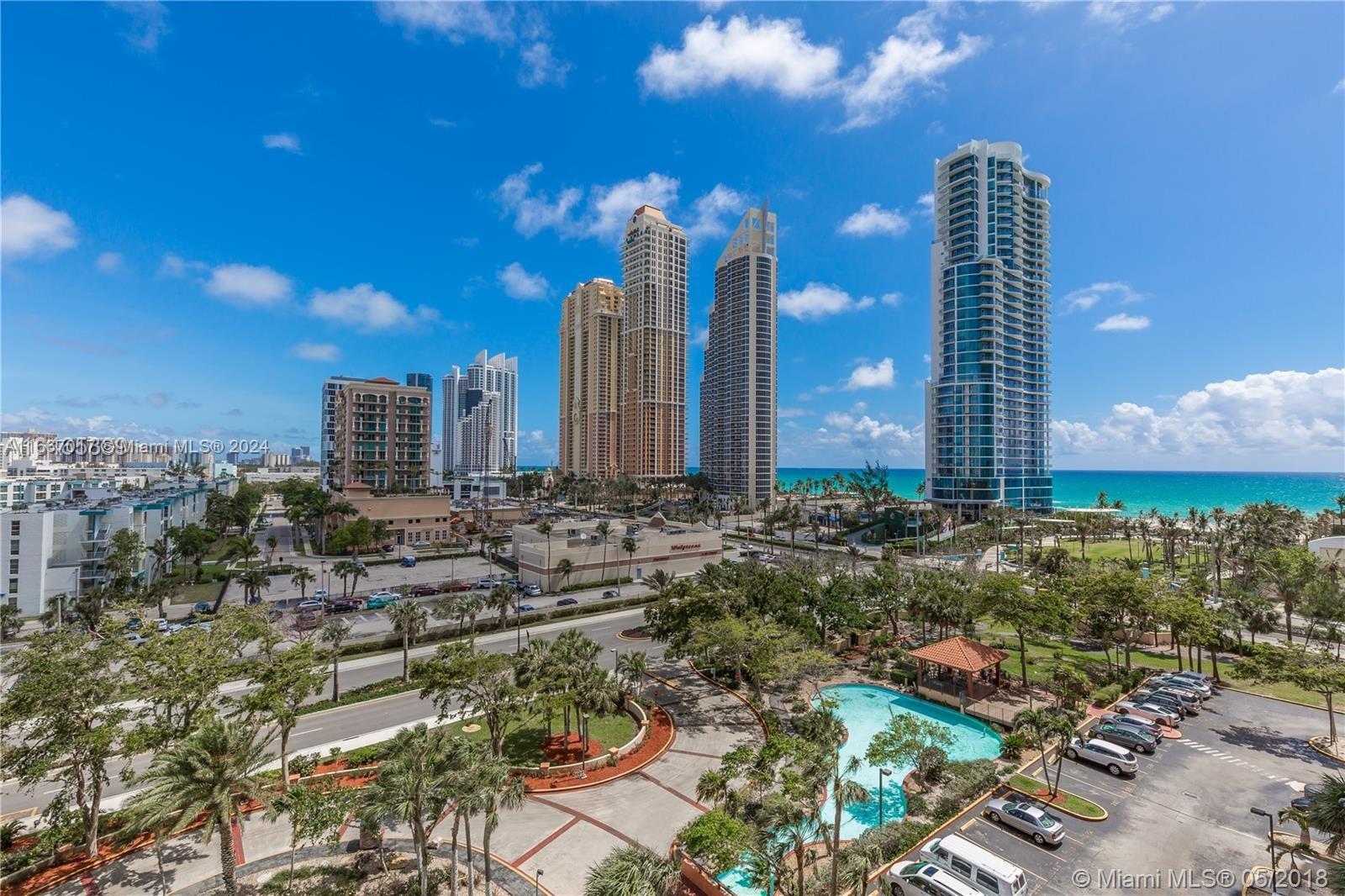 a view of a city with tall buildings