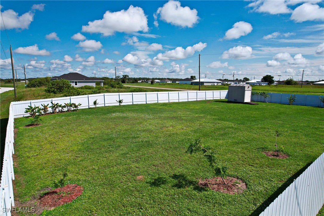 a view of a golf course with a swimming pool