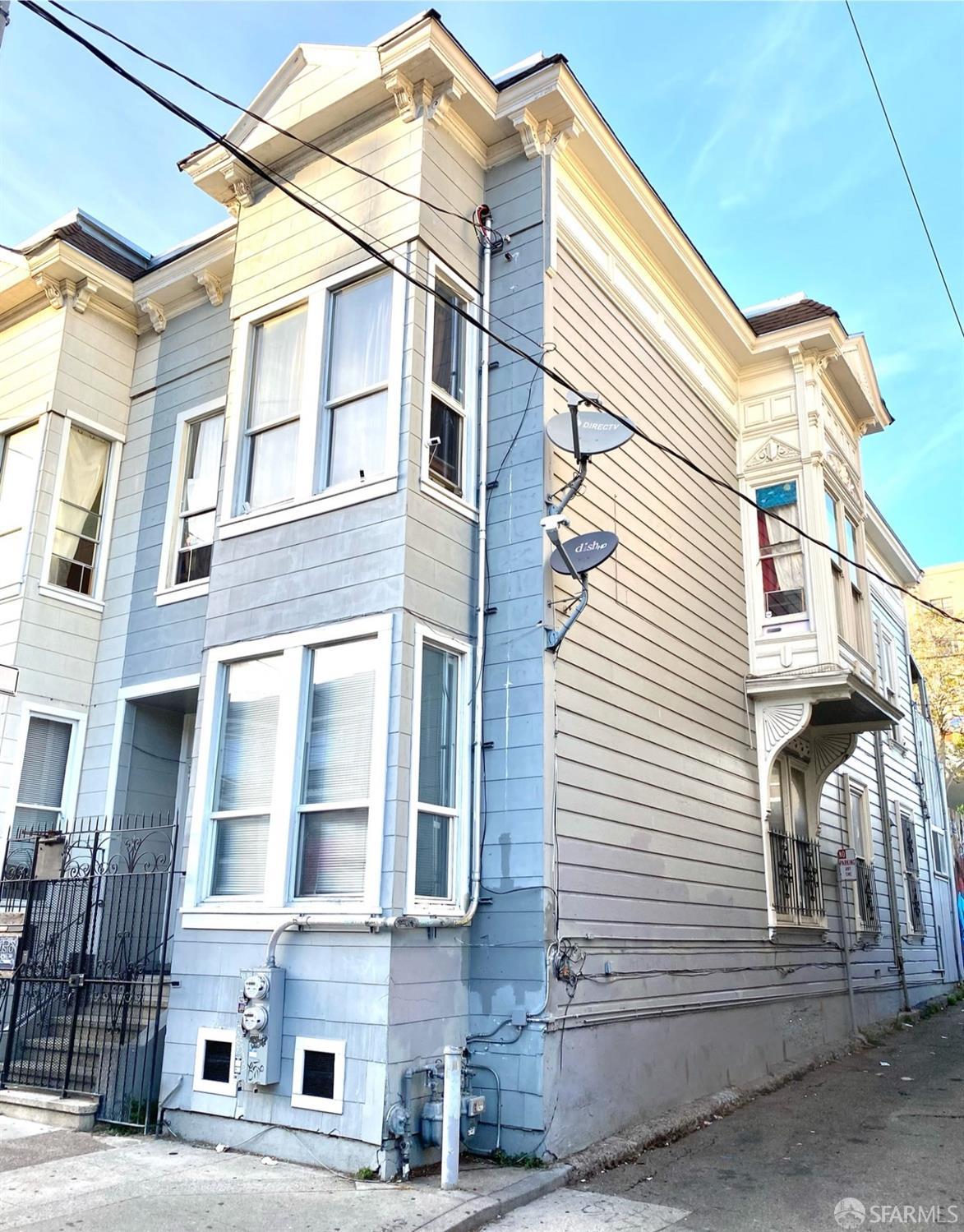 a view of a building with a street