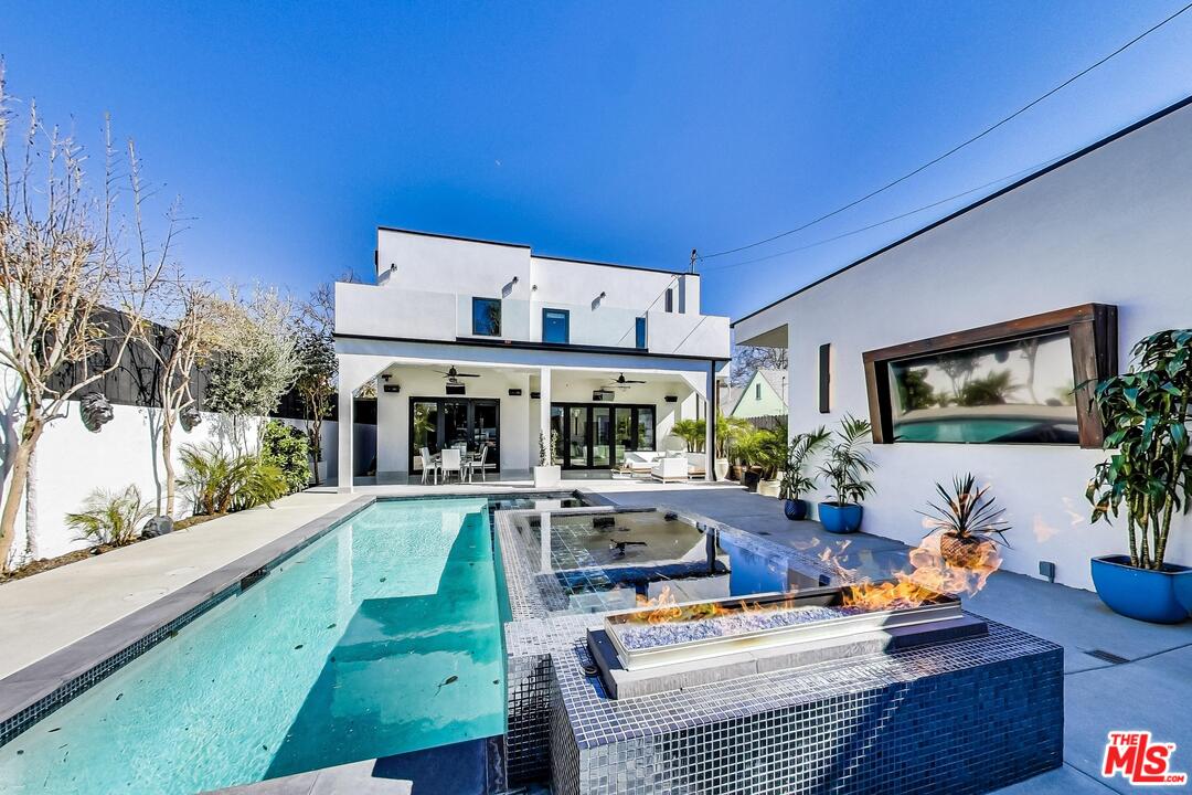 a view of a house with patio outdoor seating