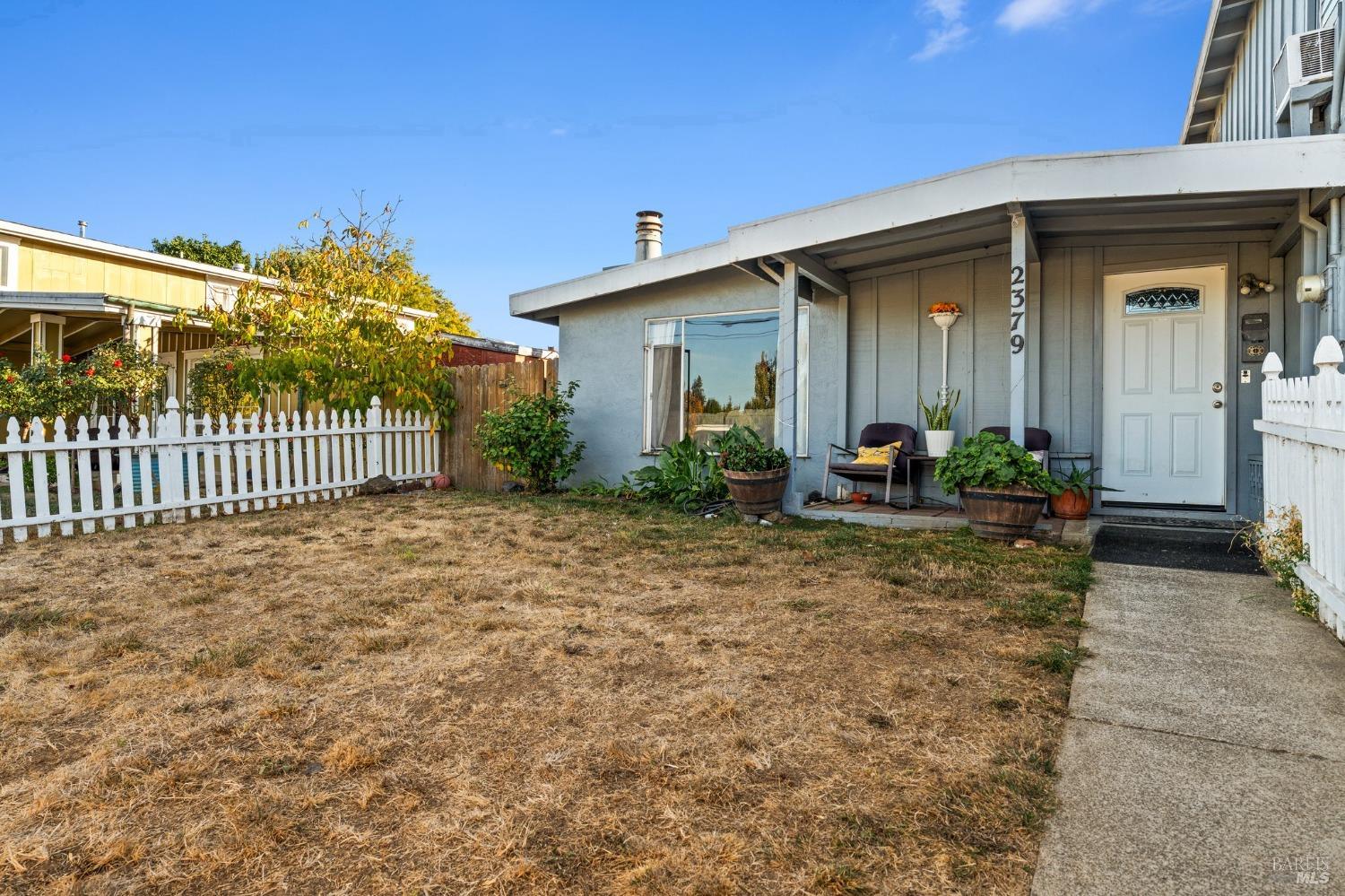 a front view of house with yard