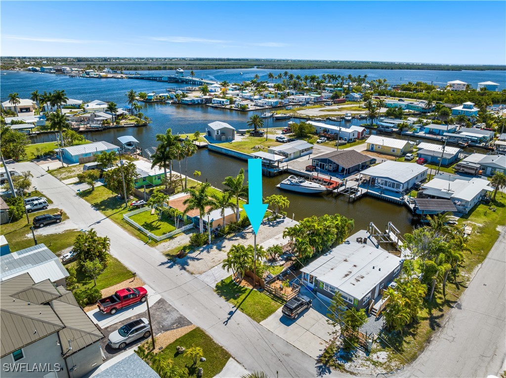 an aerial view of a houses with outdoor space