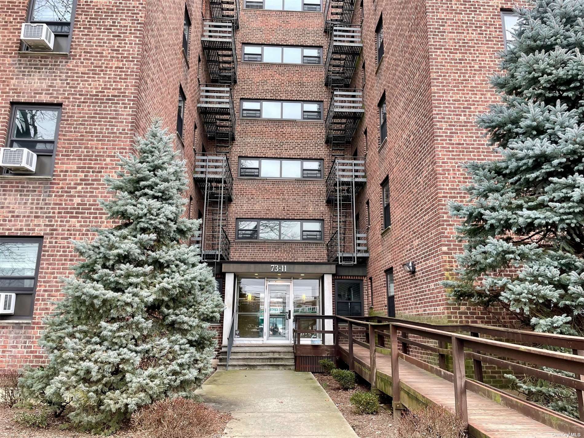 a building view with a tree