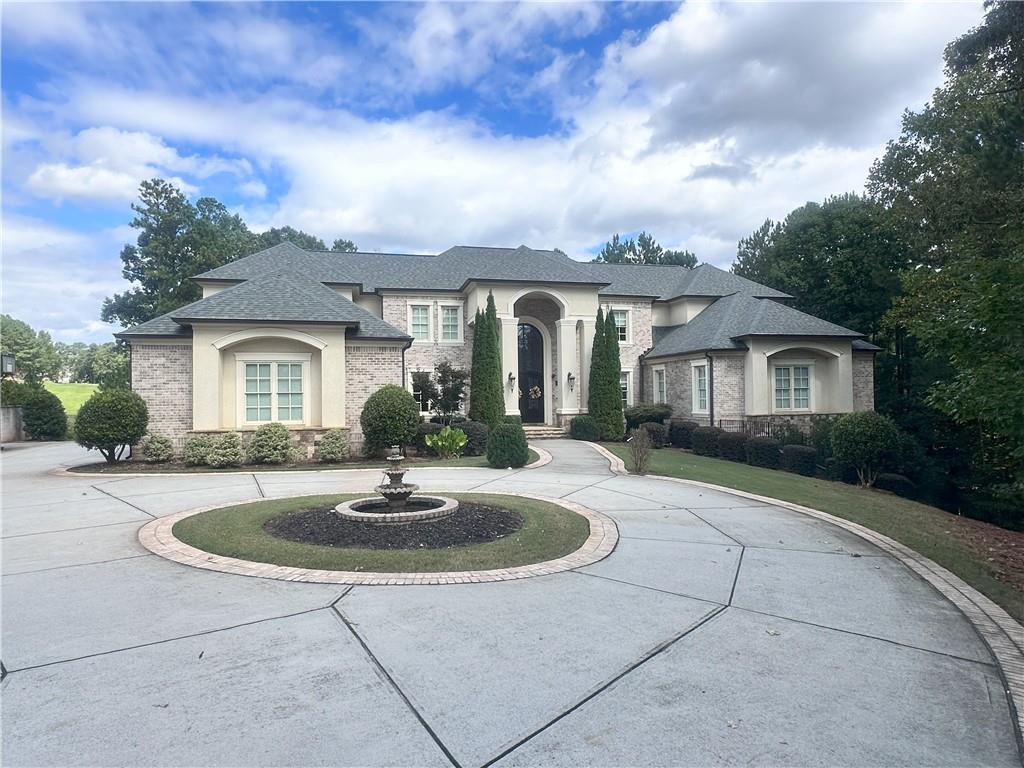 a front view of a house with entertaining space