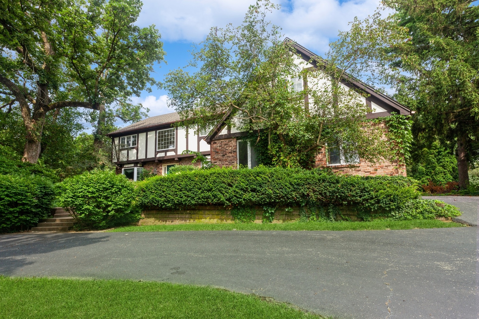 a house view with a garden space