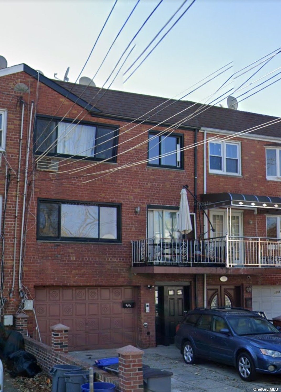 a front view of residential houses with yard