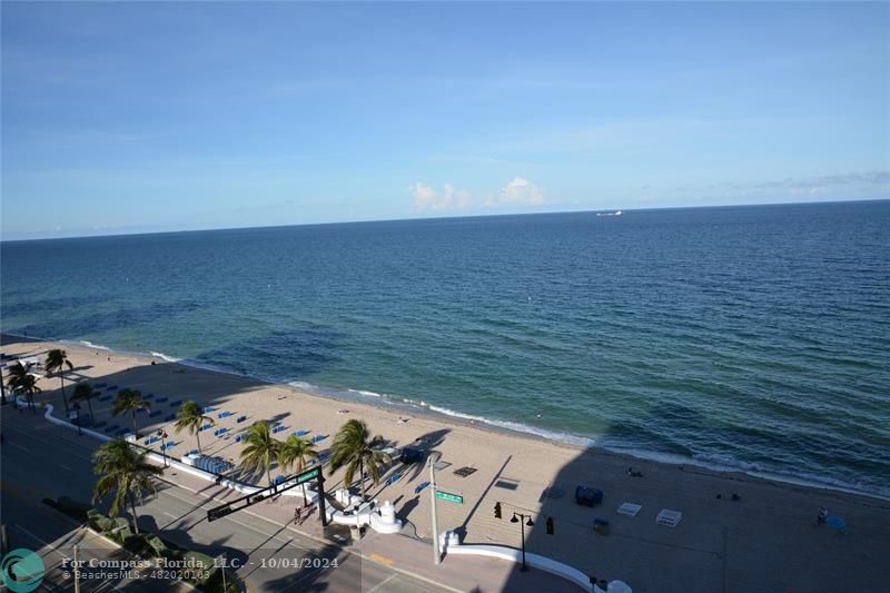 an aerial view of ocean with beach